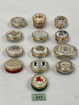 A collection of thirteen Halcyon Days Bilston enamel boxes.