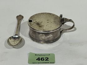 A George VI silver mustard pot, London 1947 and a silver spoon. 2ozs 15dwts.