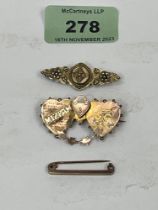 Three 9ct brooches. 7g gross.