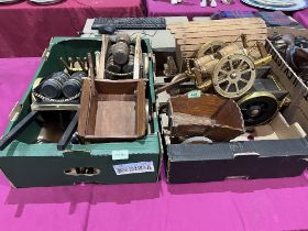 A collection of ceramic shire horses with two boxes of carts.