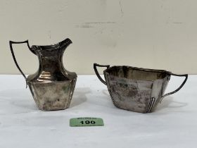 A Victorian silver cream jug and sucrier en-suite. London 1895. 4ozs 5dwts.