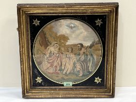 An early 19th century silk needlework and watercolour biblical scene of the Holy Family. Verre-