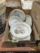 A box of Wedgewood Beatrix Potter nursery ceramics.