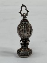 A fine and rare antique, German silver, parcel gilt and enamel pomander, the spherical body of six