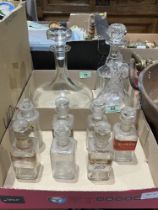 Seven chemist's poison bottles and other glassware.