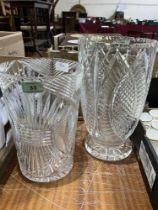 Two cut glass flower vases. The larger 12½" high.