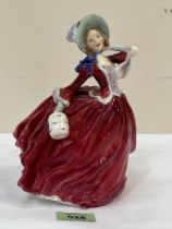 A Royal Doulton figure, Autumn Breezes HN1934. 7¾" high.