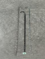 Three Victorian glass walking cane friggers. 37" long and shorter.