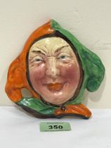 A 1930s Beswick jester wall plaque. 5¼" high.