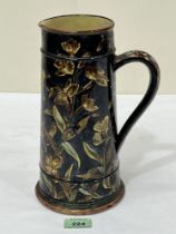 A Victorian Doulton Lambeth Faience tapered jug. 10¼" high. Dated 1877. Cracked