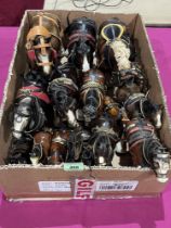 A collection of ceramic shire horses.