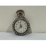 A 19th century keyless lever fob watch, the enamel dial with Arabic numerals, set with split