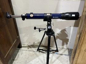 A Bresser telescope and tripod.