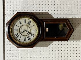 A drop cased wall clock with American movement, the dial with retailer Robinson, Ludlow 32" high.