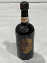 A 1902 King's Ale Bass bottle with contents. Unopened.
