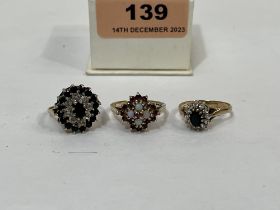 Three 9ct gem set rings. 11g gross.