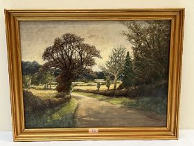 GEORGE R. WATERFIELD. BRITISH 1886 -1979. A county road. Signed. Oil on canvas 18" x 24".