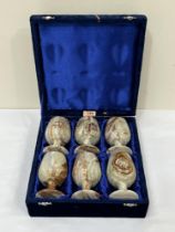 A set of six onyx goblets in velvet covered box.