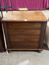 A Victorian mahogany commode, the hinged top revealing seat with inset ceramic chamber pot. 29"