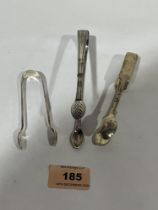 A Georgian silver bright cut sugar bow and two later examples. 2ozs 12dwts.