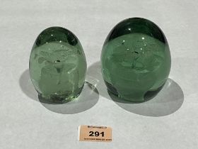 Two Victorian glass dumps with flower inclusions. 4" and 3½" high.