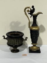 A 19th century French "grand tour" bronze and black slate vase, the body with a continuous band of