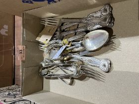 A box of plated cutlery.