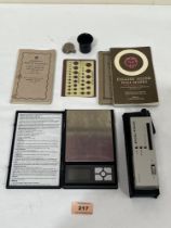 A set of gold scales, diamond tester etc.