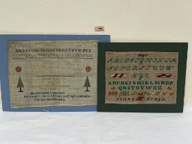 A Victorian needlework sampler by Grace Bourne 1889 worked with alphanumeric sequence, religious