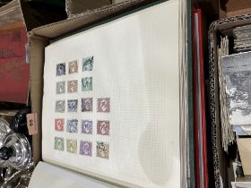 Six albums of stamps.