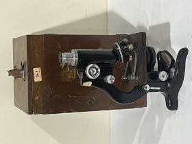 A cased monocular "Service" microscope by W.Watson + Sons, London.