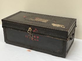 An early 19th century camphorwood, studded leather and brass mounted document chest, the lid bearing