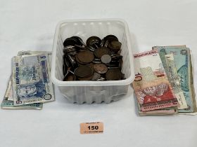 A box of banknotes and coinage.