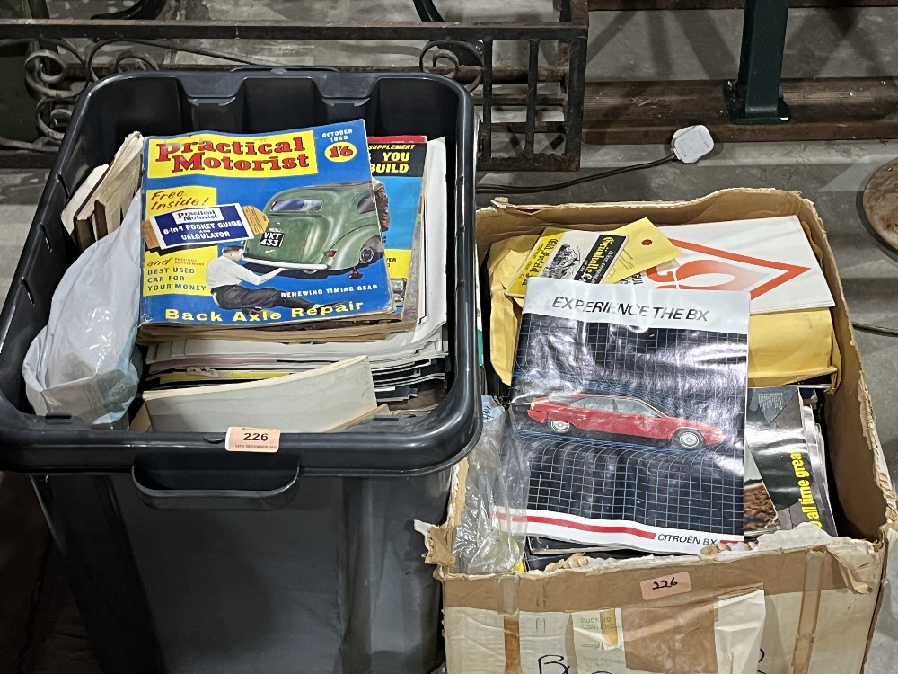 Two boxes of vintage motoring magazines.