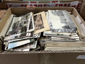 A box of postcards.