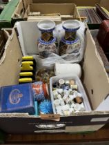 A box of ceramics and glassware.