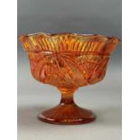 AN EARLY 20TH CENTURY AMBER CARNIVAL GLASS PUNCH SET