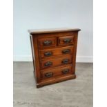 AN APPRENTICE TYPE CHEST OF DRAWERS