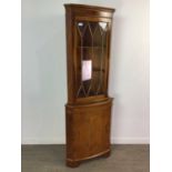 A YEW WOOD CORNER CABINET AND A BOOKCASE