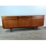 A MID CENTURY TEAK SIDEBOARD