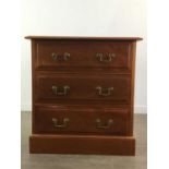 A REPRODUCTION THREE DRAWER CHEST