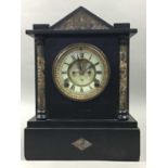 A LATE VICTORIAN AND BLACK SLATE MANTEL CLOCK
