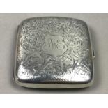 TWO GEORGE V SILVER CIGARETTE CASES AND A VICTORIAN NAPKIN RING