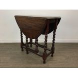 AN OAK DROP LEAF TABLE