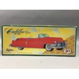 A JAPANESE CADILLAC TOY CAR AND OTHERS