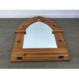A PINE WALL MIRROR OF GOTHIC DESIGN