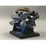 MODEL OF A FORD 427 ENGINE, AND THREE AMERICAN CAR PLATES