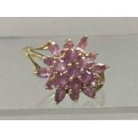 A NINE CARAT GOLD PINK SAPPHIRE RING