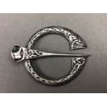 A SCOTTISH SILVER PENNANULAR BROOCH AND THREE OTHERS