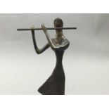 A BRONZE FIGURE OF A FLUTE PLAYER AND AN ART GLASS VASE AND BOWL